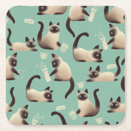 Dåliga siamesiska katter som knackar Saker över Underlägg Papper Kvadrat