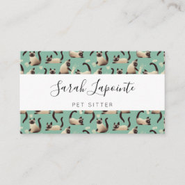 Dåliga siamesiska katter som knackar Saker över Visitkort