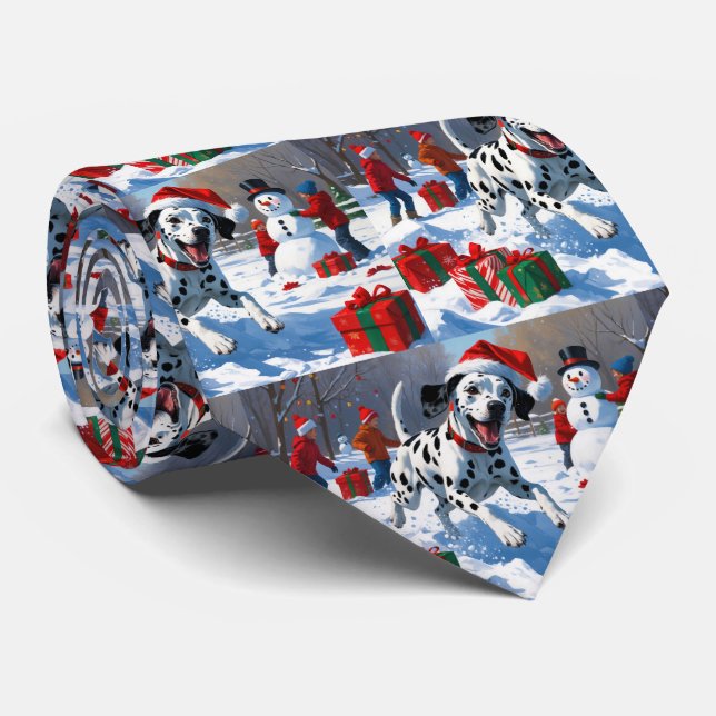 Dalmatiner springer i snö med julhatt slips (Rullad)