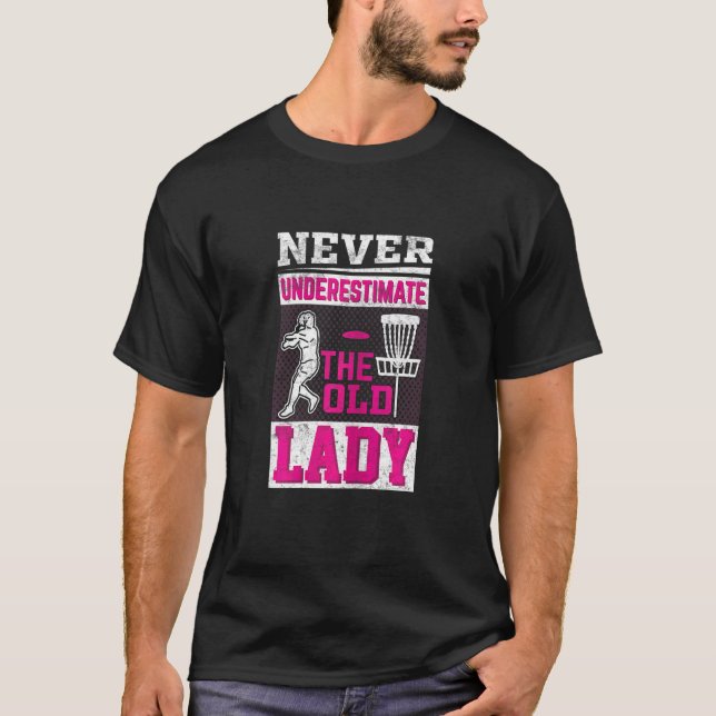 Dam Discgolf  Underskatta Aldrig Den Gamla Damen T Shirt (Framsida)