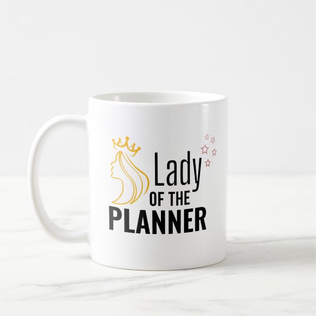 Dam i planeraren kaffemugg (Vänster)