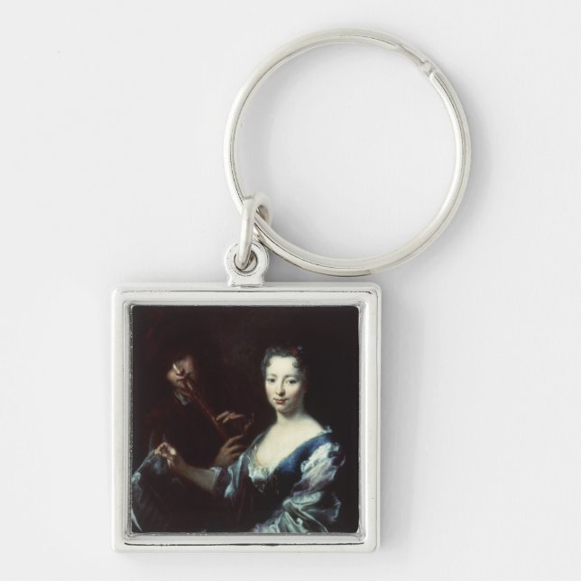 Dam som leker en spinet, och en flautist fyrkantig silverfärgad nyckelring (Framsidan)