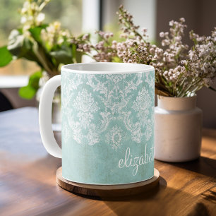 Damastast mönster för isblåttvintage med Grungy Kaffemugg