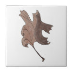Dancing Oak Löv Brown Kakelplatta<br><div class="desc">Handritad illustration av en dans ek löv inspirerad av en höstdag i Maine. Varje enskild löv från denna samling på 10 löv teckning är modellerad efter en annan dansställning.</div>