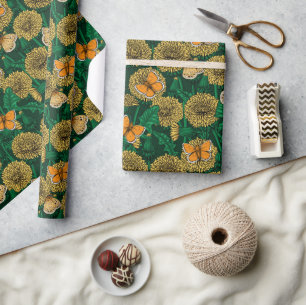 Dandelion-ängen på mörk grönt presentpapper