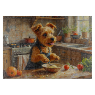 Dandie Dinmont Terrier lagar mat i köket