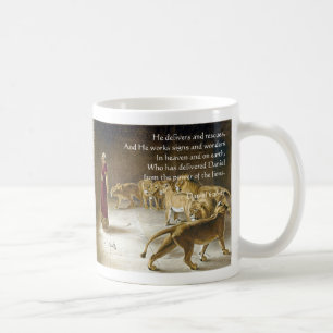 Daniel i lion'sens scripturen för konst för kaffemugg