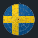 Dartboard med Flagga av Sverige Piltavla<br><div class="desc">Ta det svenska pridet till matchnatten med vår ritbord med flagga Sverige! Den här högkvalitativa ritytan är mer än bara en roligt pastime; den är en firande av Sverigens arv, perfekt för att lägga till ett kulturellt drag i ditt spelrum, kontor eller fritidsutrymme. Den ikoniska svenska flagga visas på ett...</div>