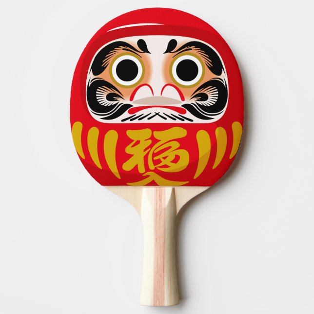 Daruma-docka (traditionell japansk lyckobringande  pingisracket (Framsidan)