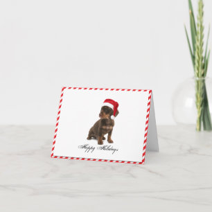 Daschund valphund i Santa hattjulkort Helgkort