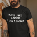 David Used a Sten I använda a Glock T Shirt<br><div class="desc">Den här designen kan vara personlig i det område som tillhandahålls genom att ändra fotot och/eller text. Du kan också anpassa den genom att klicka på Anpassa den här mallen och sedan välja klicka för att anpassa ytterligare alternativ och ta bort eller ändra färg i bakgrunden, lägga till text, ändra...</div>