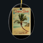 Daytona Beach Handflatan Träd Vintage resor Julgransprydnad Keramik<br><div class="desc">En unik,  medeltida modern Daytona Beach Florida-konst i vintage resor poster stil. Den har en böjd handflatan träd på sandstranden med hav under ett blått grumligt himlar.</div>