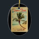 Daytona Beach Handflatan Träd Vintage resor Julgransprydnad Keramik<br><div class="desc">En unik,  medeltida modern Daytona Beach Florida-konst i vintage resor poster stil. Den har en böjd handflatan träd på sandstranden med hav under ett blått grumligt himlar.</div>