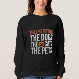 De äter hundarna katterna husdjuren Halloween T Shirt