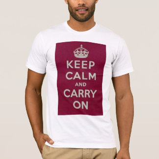 DEBACLEBEHÅLLALUGN OCH BÄR PÅ T-SKJORTAN T-SHIRT