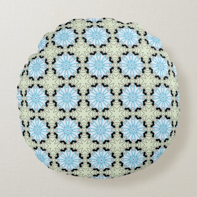 decorative pillow featuring a geometric pattern rund kudde (Framsidan)