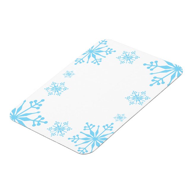 Dekorativ blå snöflingmagnet. magnet (Vänstra Sidan)