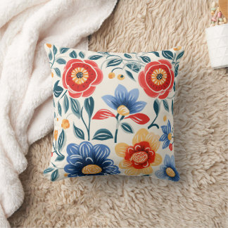 Dekorativ kudde med livfullt blommotiv