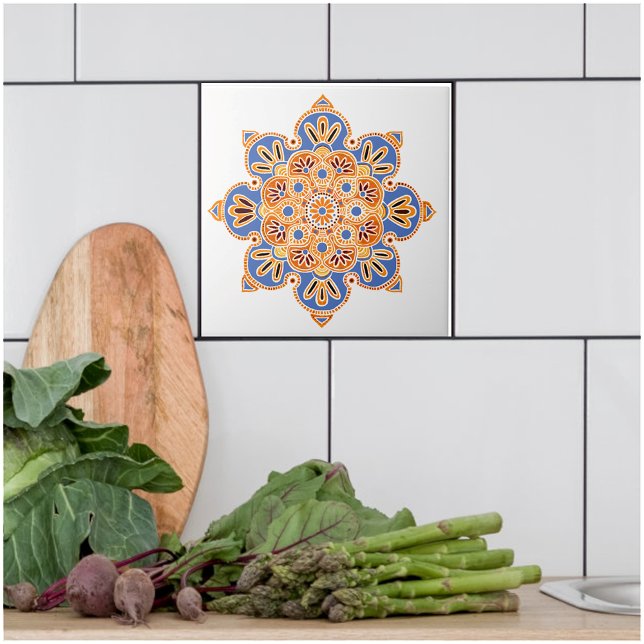 Dekorativ orange och blått kakelplatta (Blue and orange medallion tile for kitchen bath or fireplace.)