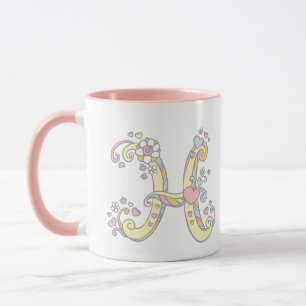 Dekorativa monogram H-hjärtan och blommor mugg