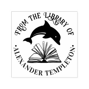 Delfin hoppar över bibliotekets namn på öppen bok självfärgande stämpel