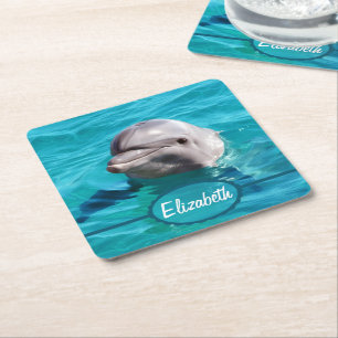 Delfin i blåttvattenfoto underlägg papper kvadrat