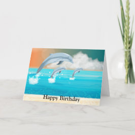 Delfiner som bryter i havet kort