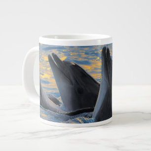 Delfinerna i flaska i solnedgången jumbo mugg
