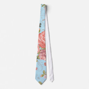 Den bosatt korallbukett med rosor med blommigt slips