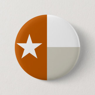 Den brända orange Texas flagga knäppas Knapp