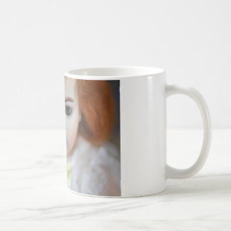 Den Bru Jumeau dockaantikviteten fotograferar Kaffemugg