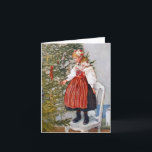 Den Carl Larsson julgranen noterar kort<br><div class="desc">Tittar Larssons målningar lämnar alltid mig känsla förnyad, och denna är inget undantag. Jag älskar den behagfulla linjer, känslan av lugna förväntan, och avkänningen av en lycklig familj som denna målning frammanar. Tom insida. Beskrivning: Blond flicka för söt en lite i traditionella folk kostymerar stativ på en stol att tillfoga...</div>