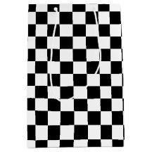 Den djärva svartvita rutiga gåvan hänger lös