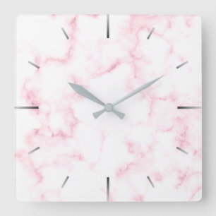 den eleganta moderna pastellfärgade rosa- och fyrkantig klocka