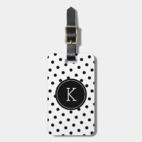 Den eleganta svartvita polkaen pricker monogramen