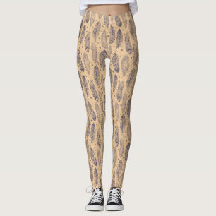 Den etniska fjädern skisserar mönster leggings