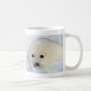 Den fluffiga harpan förseglar valpen kaffemugg