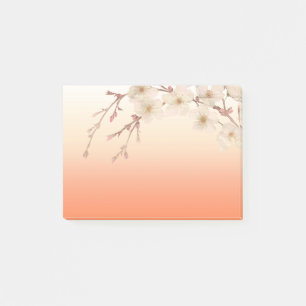 Den fodrade orangen skuggar gren av vitblommar post-it block