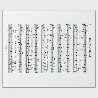 Den första Noelen som slår in papper Presentpapper