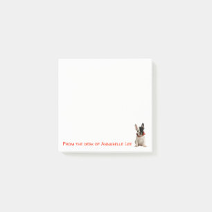 Den franska bulldoggen noterar post-it block