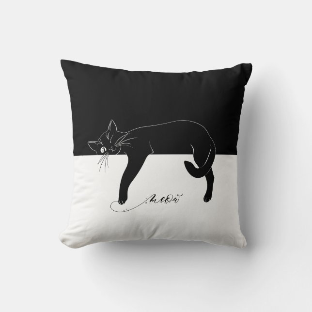 Den grindande svarta katten tog sin tass i fara kudde (Framsida)