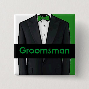 Den gröna smokinganpassadegroomsmanen knäppas knapp