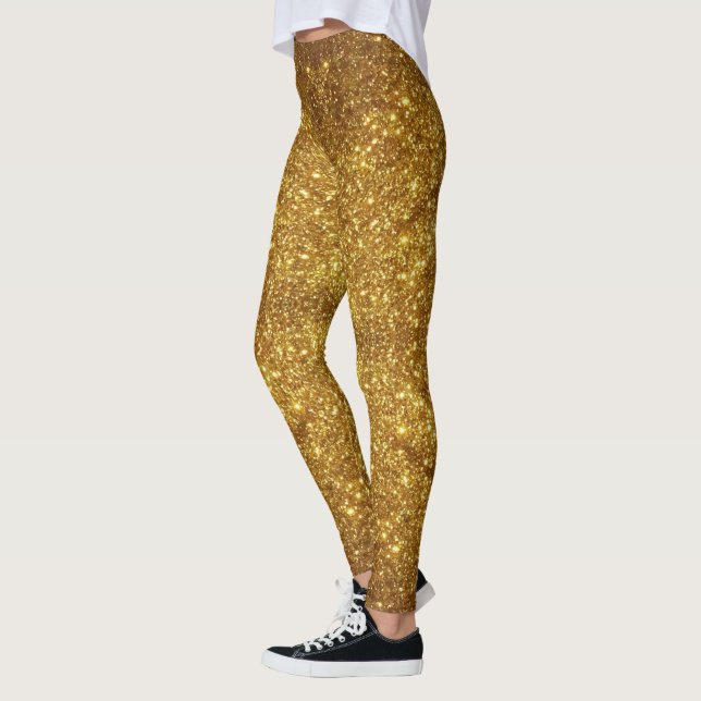 Den guld- glittergnistran verkställer damasker - leggings (Vänster)