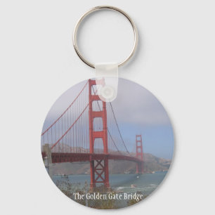 Den guld- grinden överbryggar Keychain Nyckelring