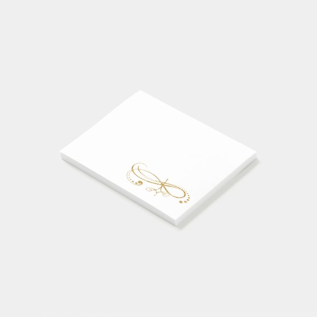 Den guld- prydnaden postar det noterar post-it block (Vinklad)