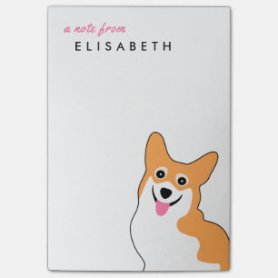 Den gulliga corgien noterar post-it block