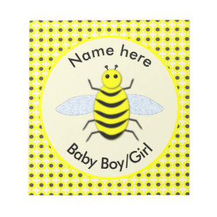Den gulliga gula babybigender avslöjer neutralt anteckningsblock