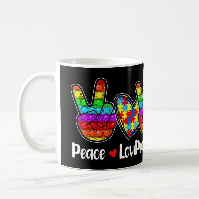 Den här Noveltyn spottar med Ord "Peace Kärlek Aut Kaffemugg (Vänster)