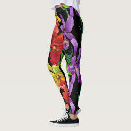 Den härliga akvarellorchiden blommar på svart leggings