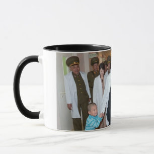 Den kära ledare älskar lite barn mugg